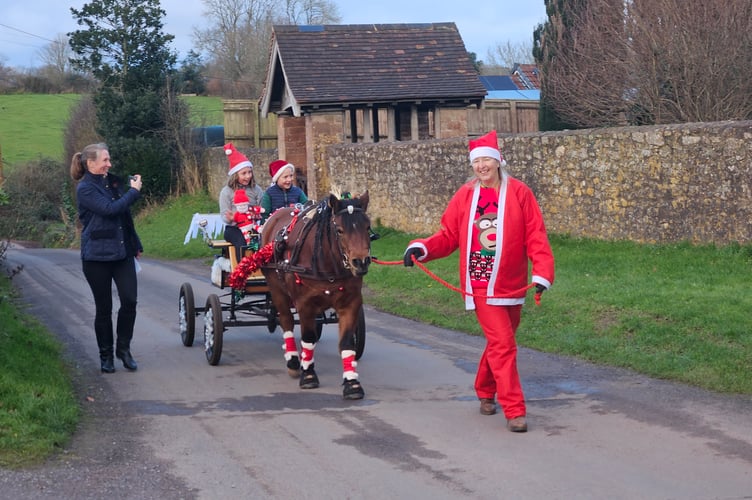 'Mossy' and the 'ChrisMoss' carriage take tour of Fitzhead to raise money for 14th century Tithe Barn